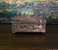 Front view showing relief dog scene and four feet