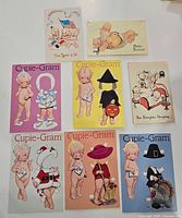 Fronts of nine Kewpie/Cupie-Gram postcards arranged in a 3×3 grid