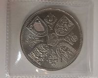 Full view of reverse of coin in plastic sleeve