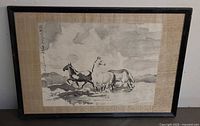 Front view of framed ink wash painting