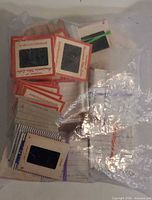 Bag of assorted cardboard-mounted 35mm slides