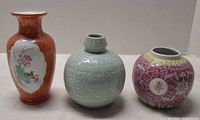 Front view of all three vases together