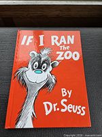 Front cover of If I Ran the Zoo by Dr. Seuss, red background, illustrated character