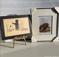 Both framed prints side by side showing full lot contents