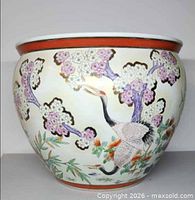 Side view showing full crane and blossom artwork