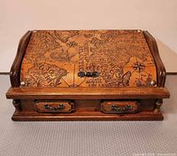 Organizer closed showing map print lid and drawers