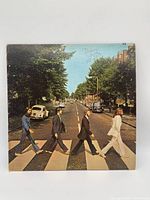 Front sleeve with Abbey Road cover art and handwriting
