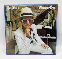 Front album cover with Elton John portrait