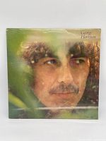 Front cover with portrait of George Harrison