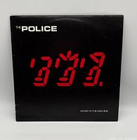 Front album jacket with title and digital numerals