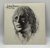 Front cover showing portrait artwork and title