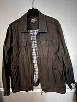 Full front view of jacket on hanger