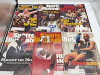 All six Sports Illustrated magazines laid out, showing fronts