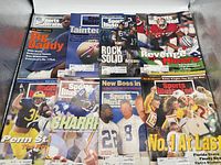 Seven Sports Illustrated magazines laid out showing all covers