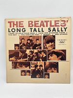 Front cover showing album title, artist, photo collage, wear visible