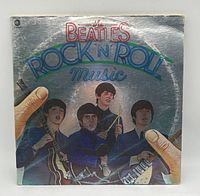 Front of gatefold sleeve showing title and band image