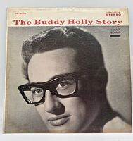 Front cover showing Buddy Holly portrait, title and Coral Records branding