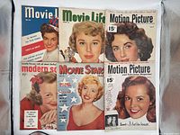 Six vintage movie magazines laid out