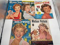 Front covers of five magazines laid out on white background