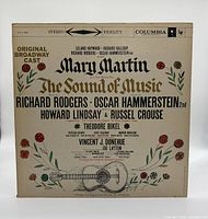 Front cover showing title, credits, floral design