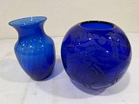 Both cobalt blue vases side by side