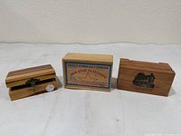 Front view of all three wooden boxes lined up