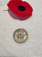 Reverse side showing lion on crown and date 1947