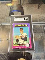 Front view of encapsulated 1975 Topps Nolan Ryan card showing grade label