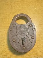 Front of padlock showing Southern Pacific logo and keyway