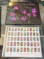 Album cover and full uncut stamp sheet