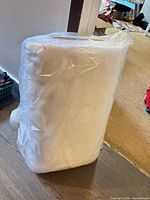 Entire bolt sealed in plastic