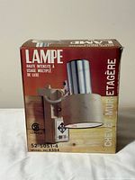 Front of box showing product image, model and French text