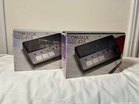 Two boxed Com-Talk GEE-825 intercom units front view