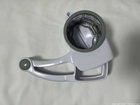 Side view of rotary shredder showing drum and handle