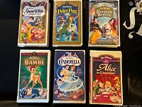 Front covers of six Disney VHS tapes
