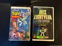 Toy Story and Buzz Lightyear VHS tapes front view