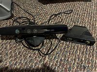 Front and top view of Kinect sensor with cabling and Nyko Zoom accessory