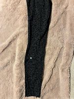 Side leg view with Lululemon logo on calf