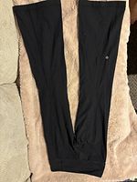 Full view of both legs laid flat showing overall condition and fabric