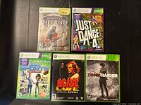 Front view of all five Xbox 360 game cases