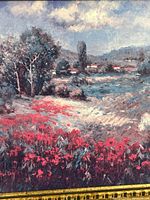 Close view of textured print showing landscape details and color palette