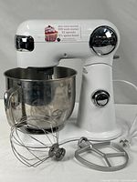Overall view of Cuisinart SM-50 mixer with bowl, whisk and beater