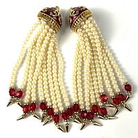 Full view of both tassel earrings showing length and design