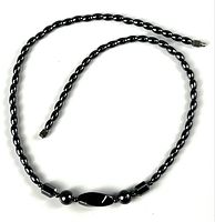 Full view of hematite necklace laid flat