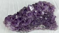 Top view showing entire amethyst cluster with crystal points