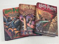 Front covers of all three Harry Potter hardcovers