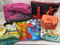 Group shot of all insulated totes and grocery bags