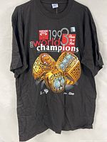Front view of black T-shirt showing full championship graphic