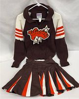 Full view of sweater and skirt laid flat