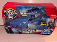 Front of sealed box displaying Hot Wheels Battle Force 5 Buster Tank graphics